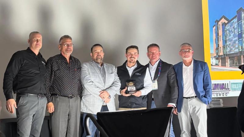 Key Industries team accepting ICF Builder Awards for 21 Summer Street